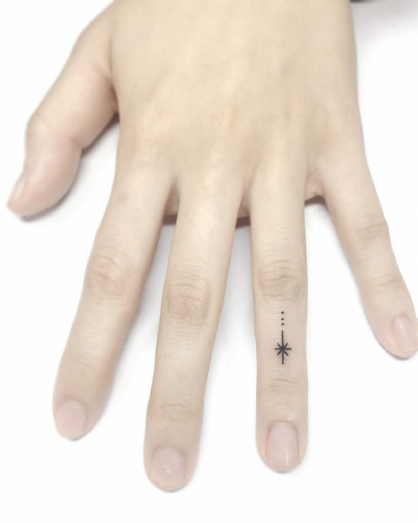 Shooting star tattoos on fingers