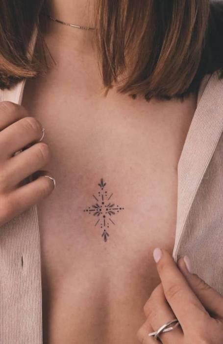 Minimalist Sternum Tattoo Design