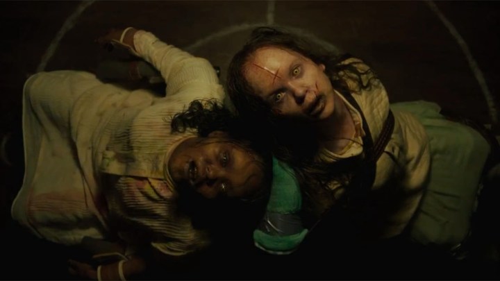 two possessed children look inward "Exorcist: Believer."