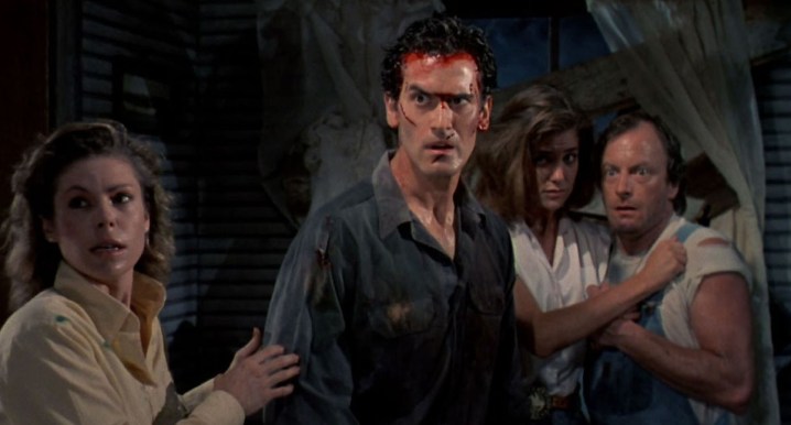 Ash looks covered in blood "Evil Dead 2: Dead by Dawn."