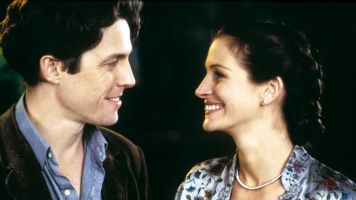 Hugh Grant and Julia Roberts staring at each other in Notting Hill.