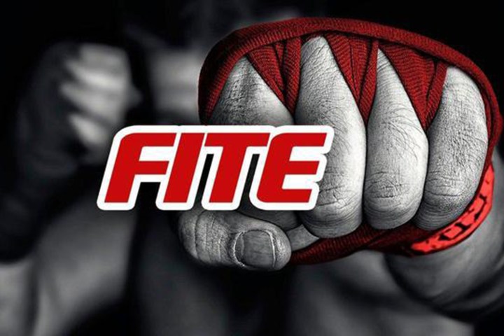 FITE TV logo with a clenched fist in the background.