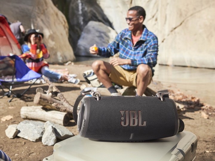 Black version of JBL Extreme 3 Bluetooth speaker at the campsite.