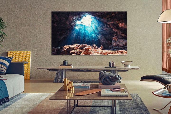 The Samsung 85-inch 8K hangs on the living room wall.