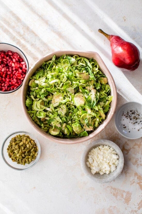 Shaved Brussels Sprouts, Pears, Pomegranate and Pepitas and Goat Cheese