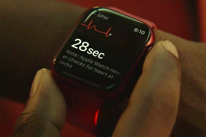 A man checking his heart rate on the brand new Apple Watch Series 7.