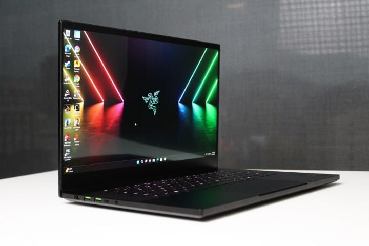 Razer Blade 15 OLED on a white table.