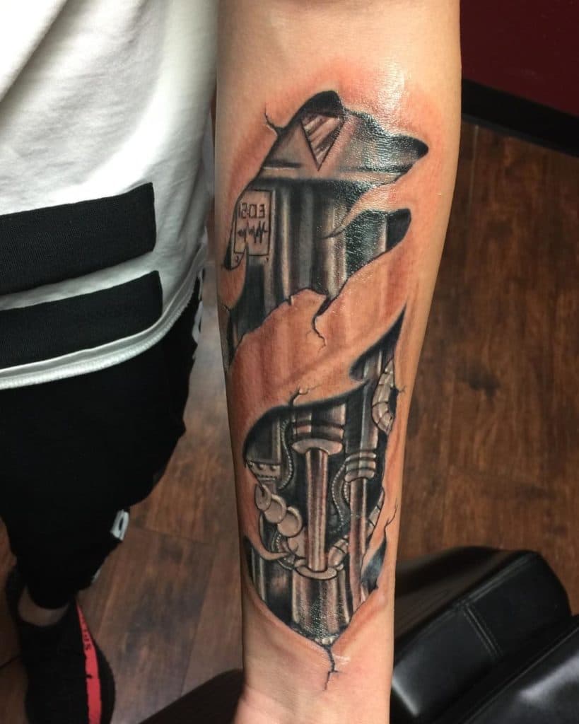 robot arm tattoo