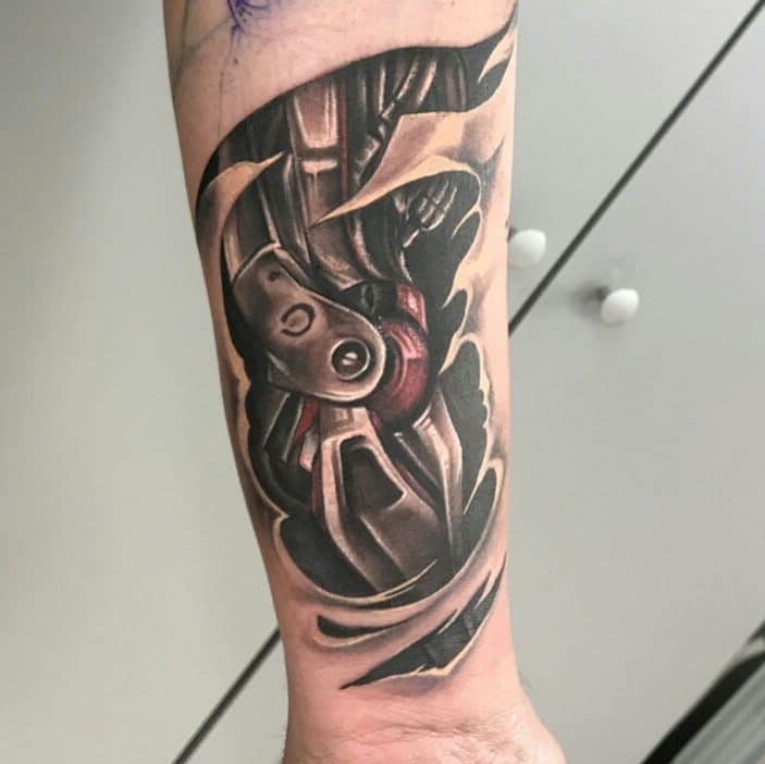 robot arm tattoo