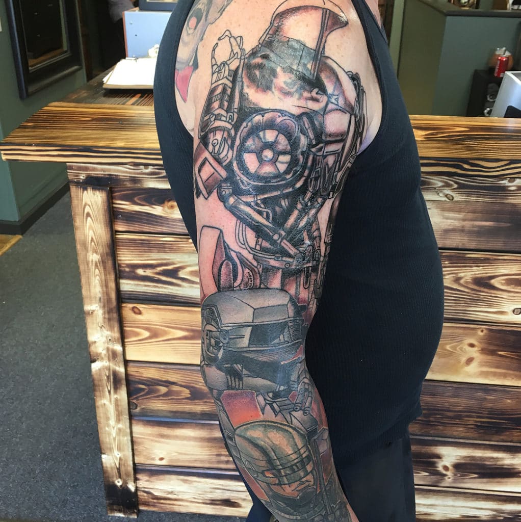 robot arm tattoo