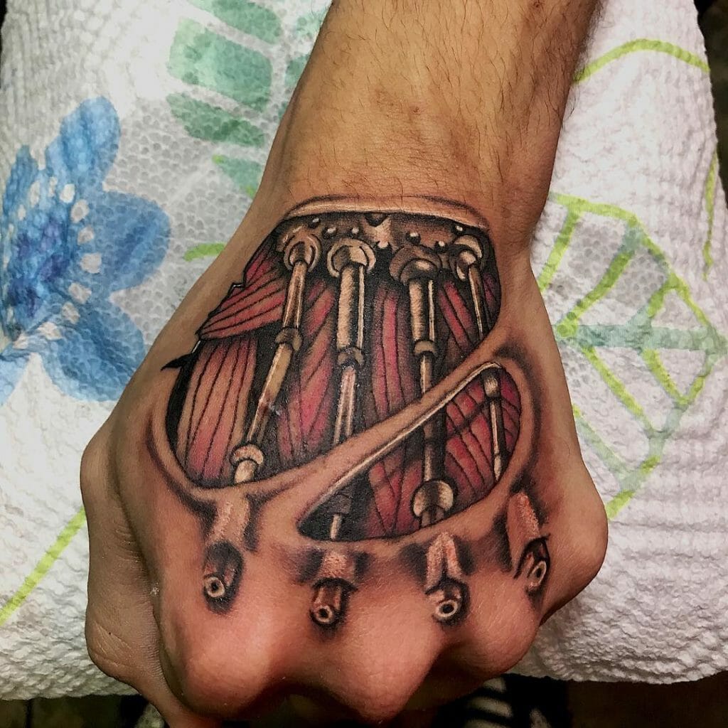 robot arm tattoo