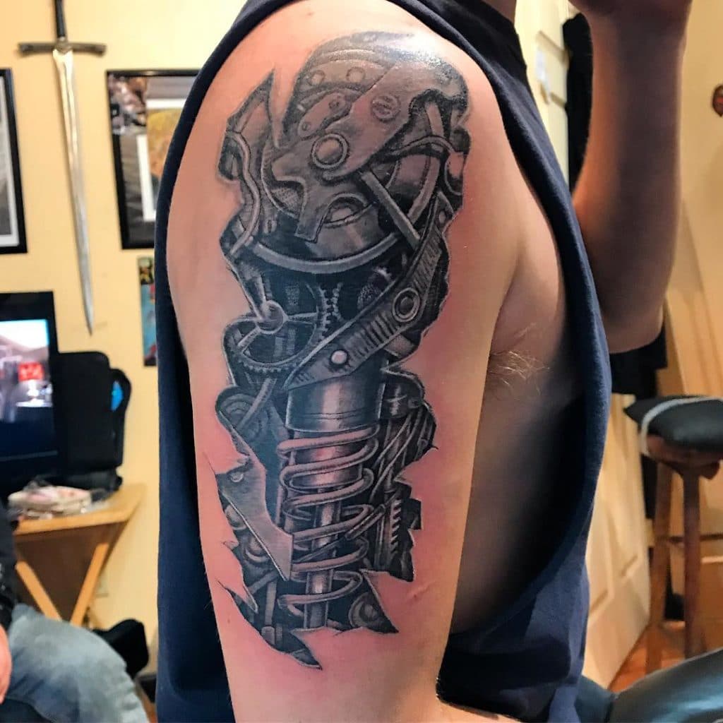 robot arm tattoo