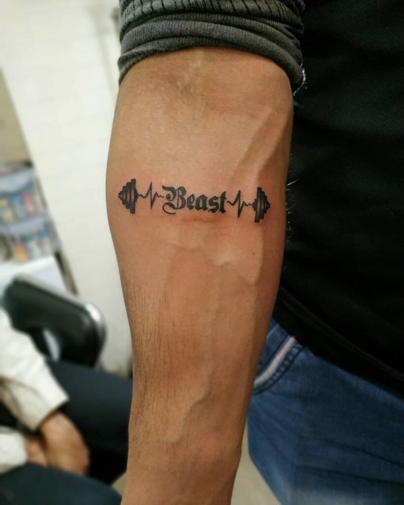 dumbbell tattoo