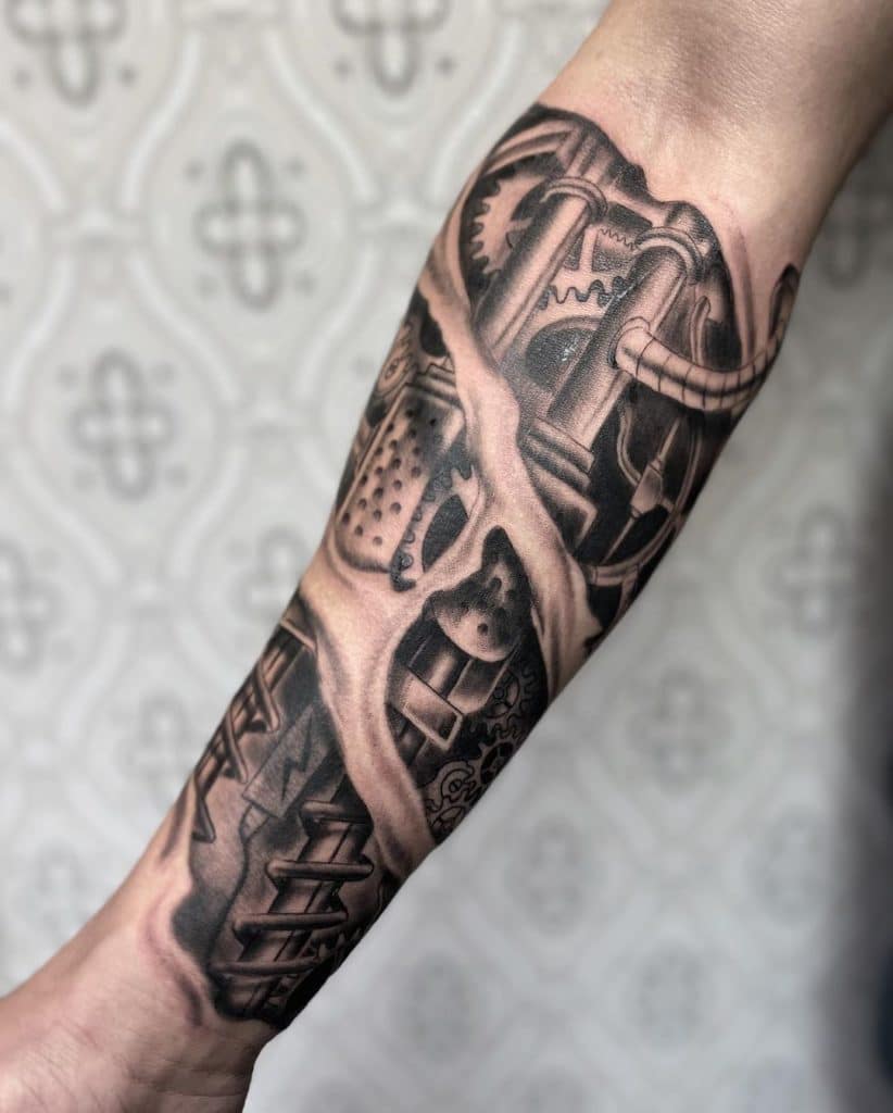 robot arm tattoo