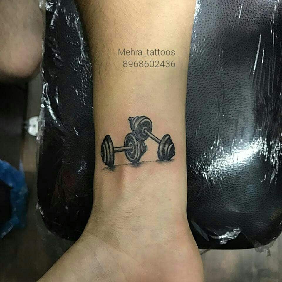 dumbbell tattoo