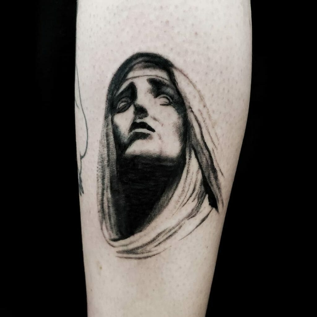 virgin mary tattoo