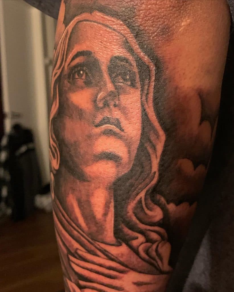 virgin mary tattoo