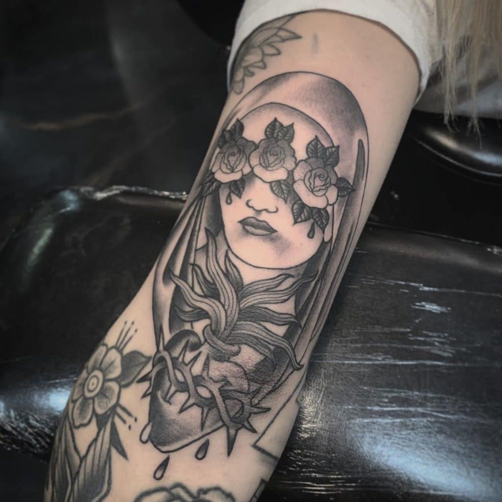 virgin mary tattoo