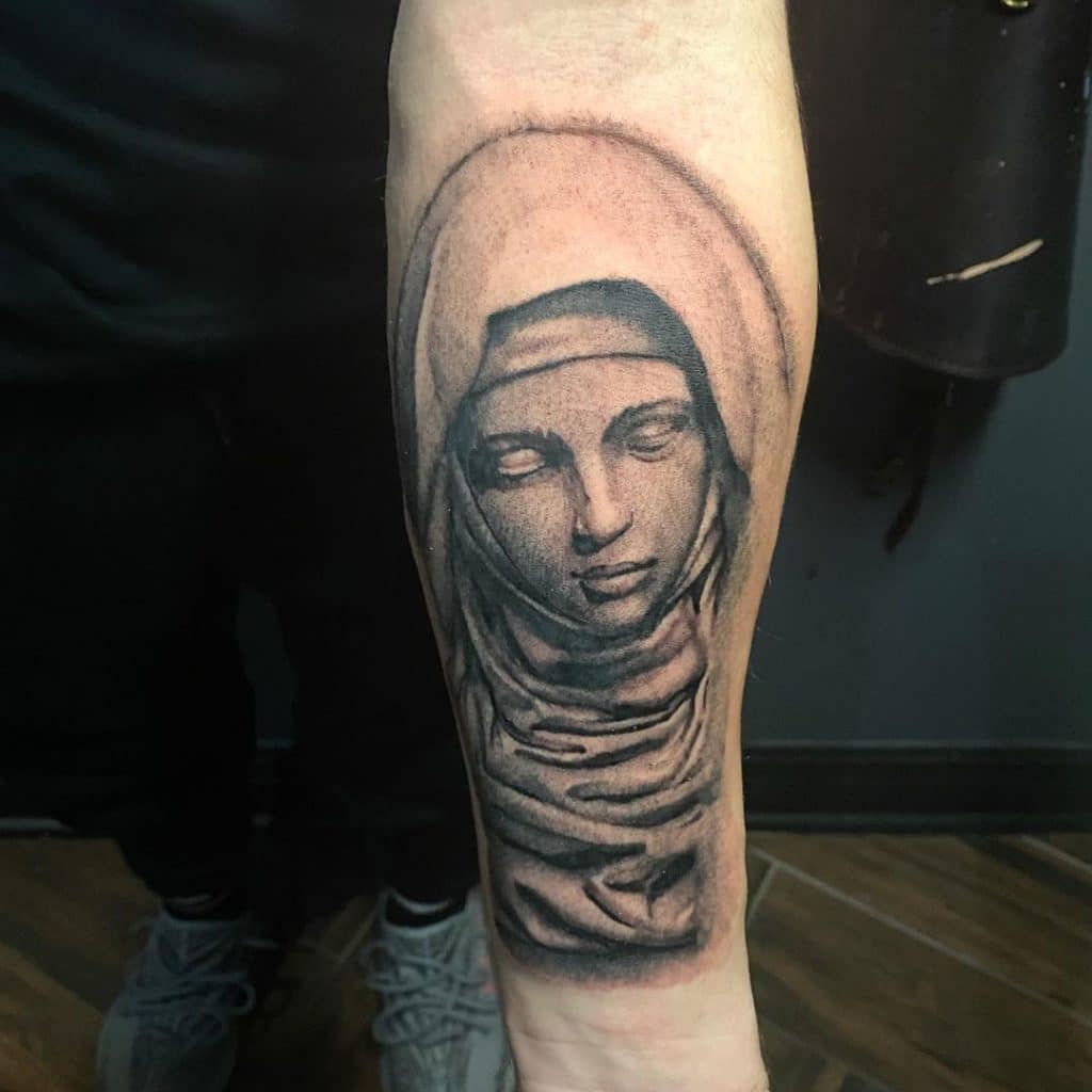 virgin mary tattoo