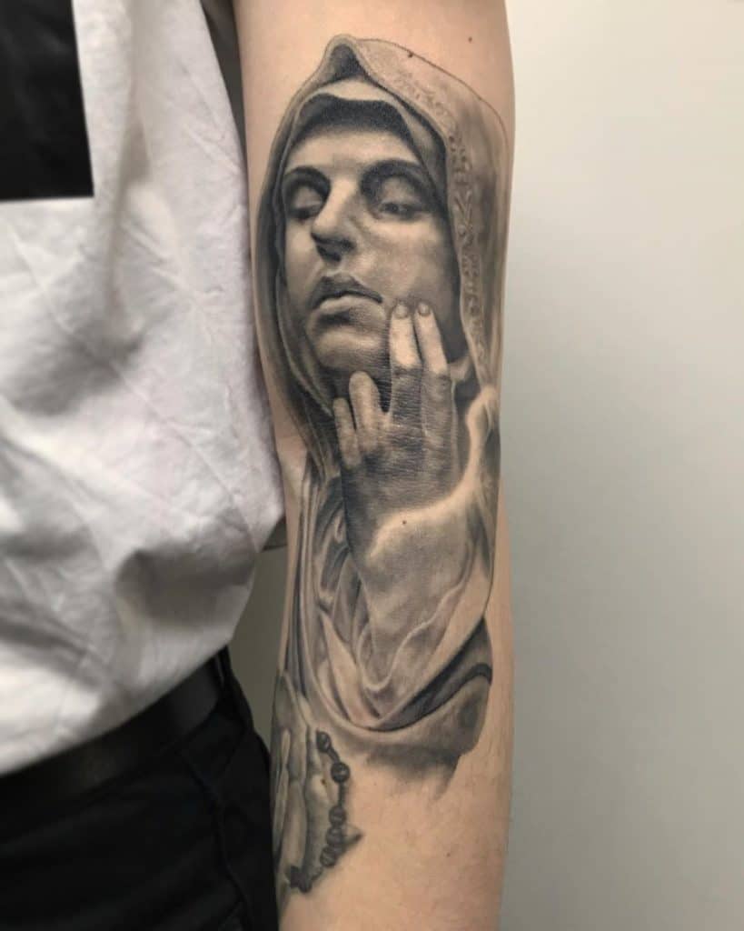 virgin mary tattoo