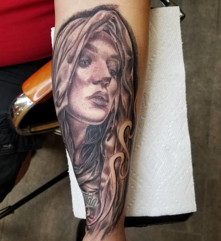 virgin mary tattoo