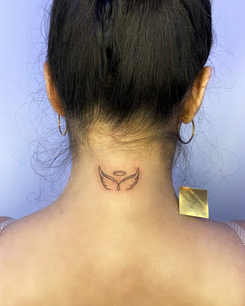 Tiny Angel Wings Tattoo