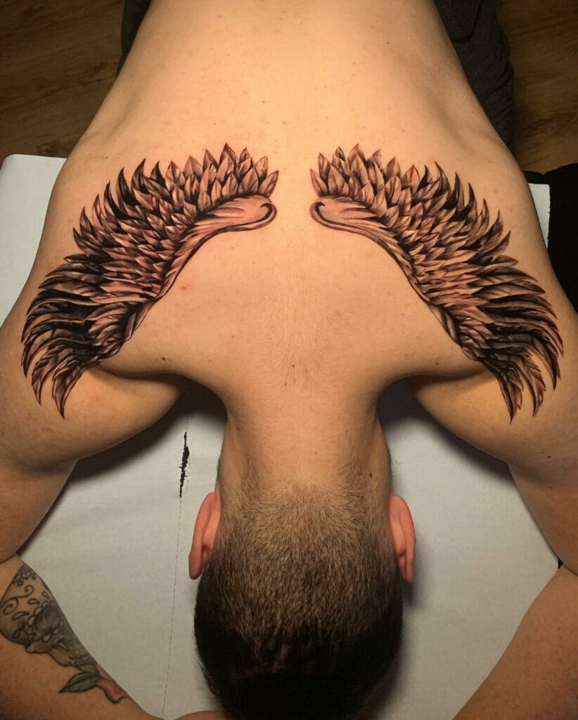 Tiny Angel Wings Tattoo