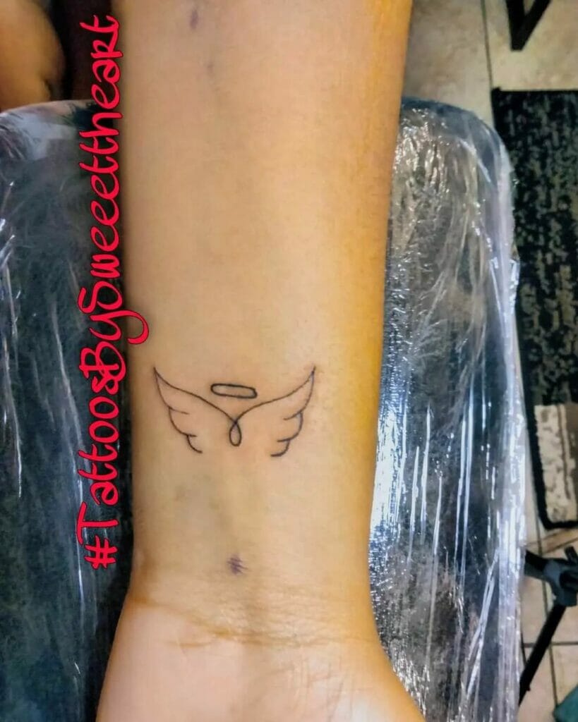 Tiny Angel Wings Tattoo