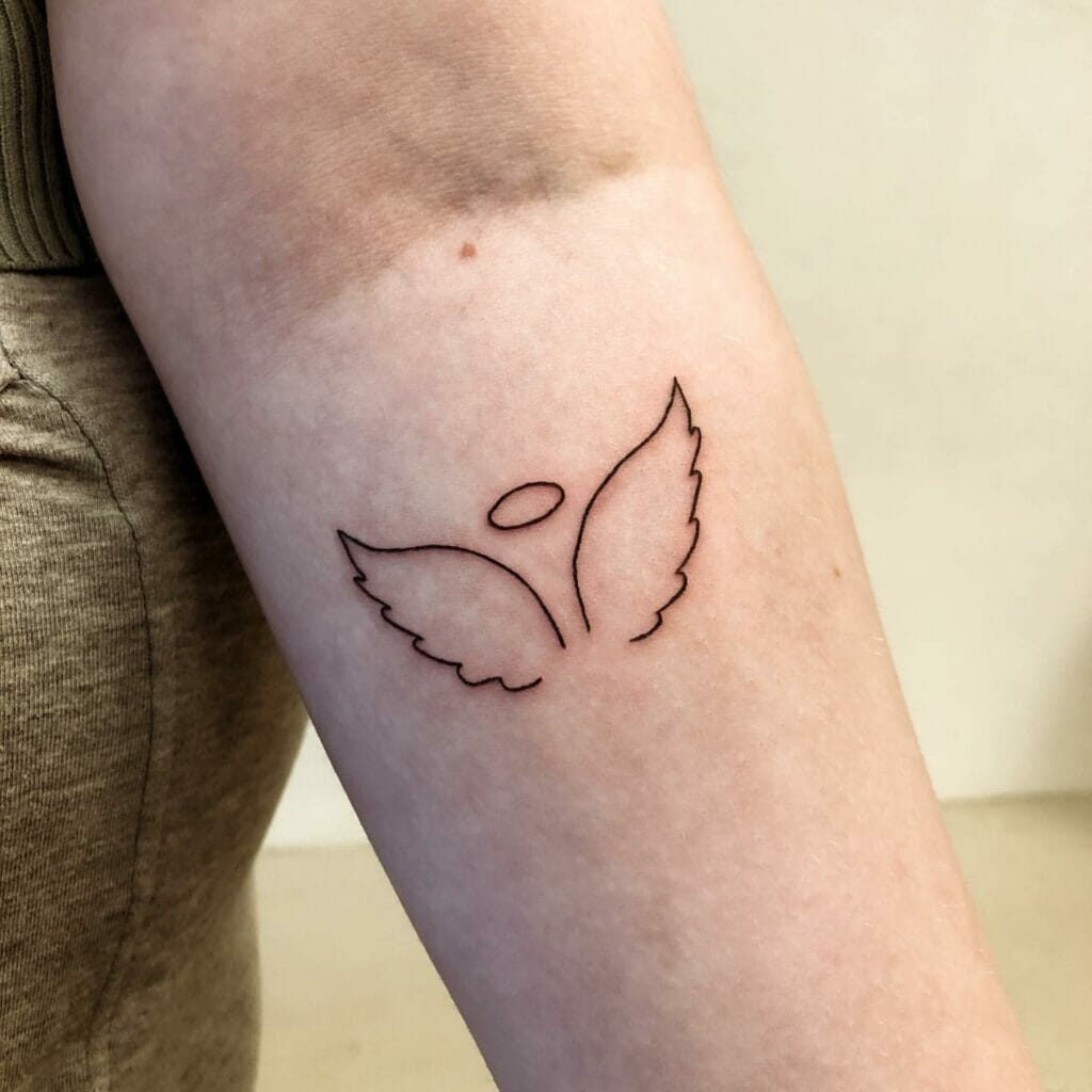 Tiny Angel Wings Tattoo