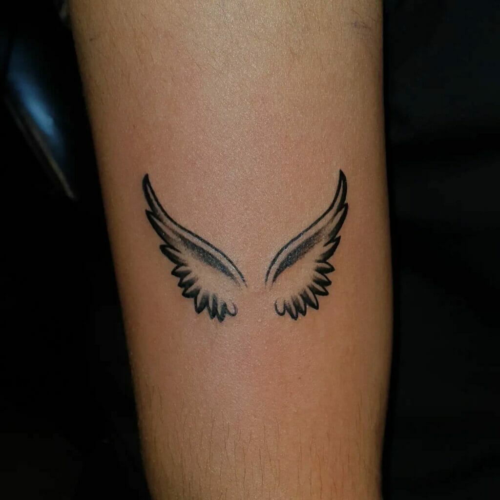 Tiny Angel Wings Tattoo