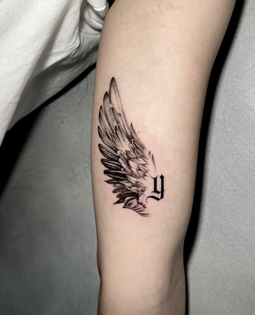 Tiny Angel Wings Tattoo