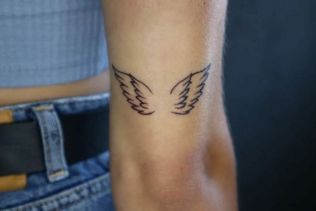 Tiny Angel Wings Tattoo