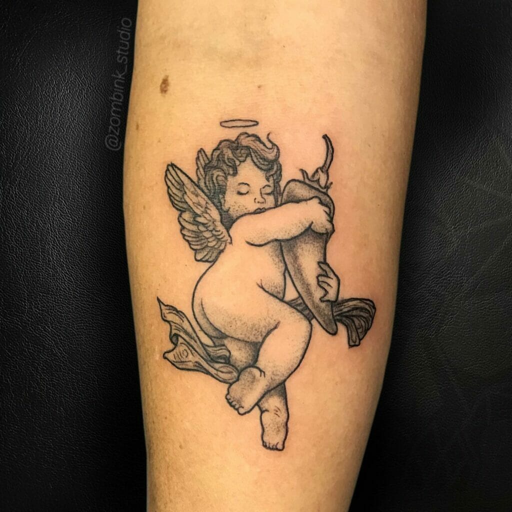 Tiny Angel Wings Tattoo