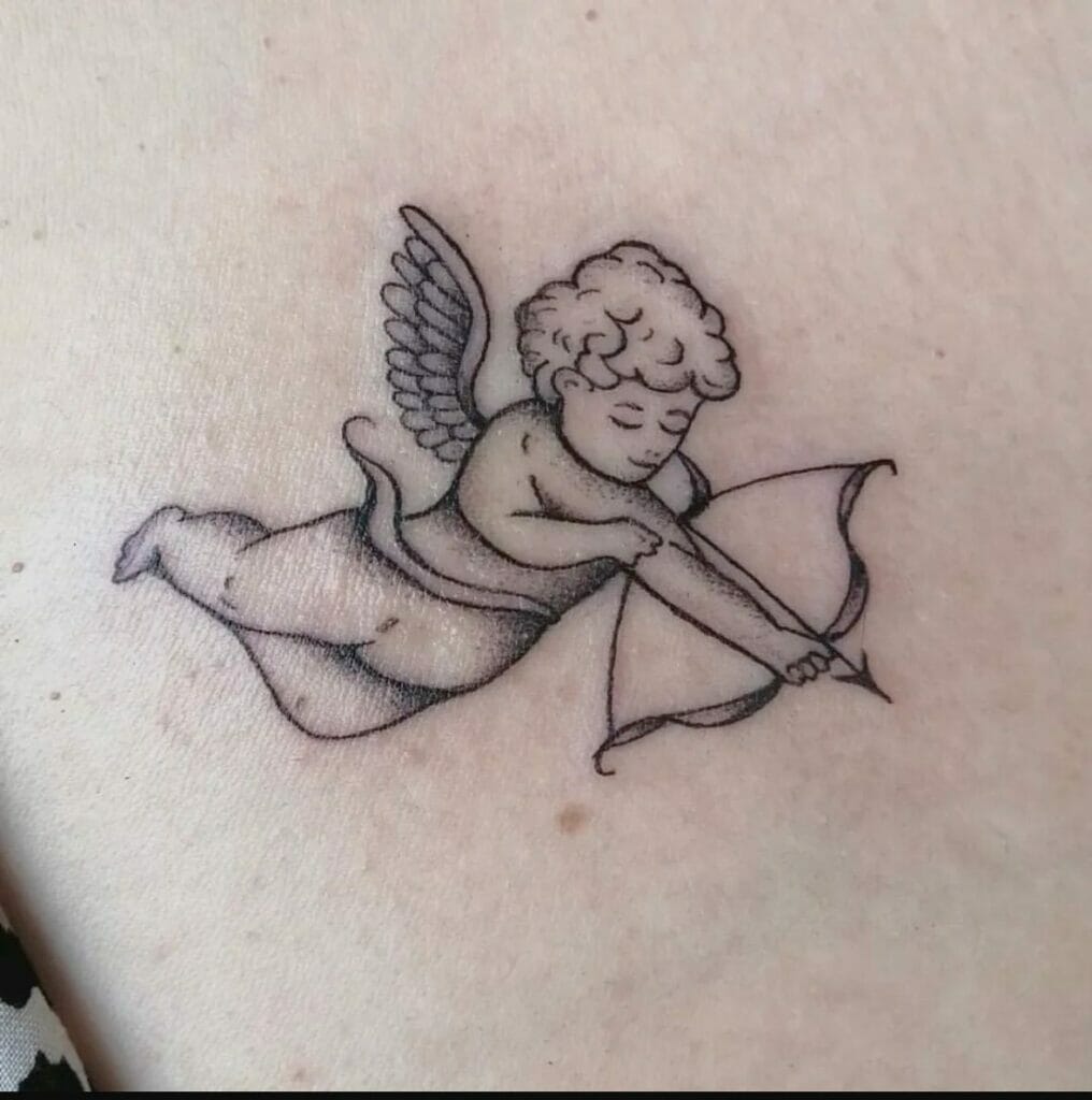 Tiny Angel Wings Tattoo