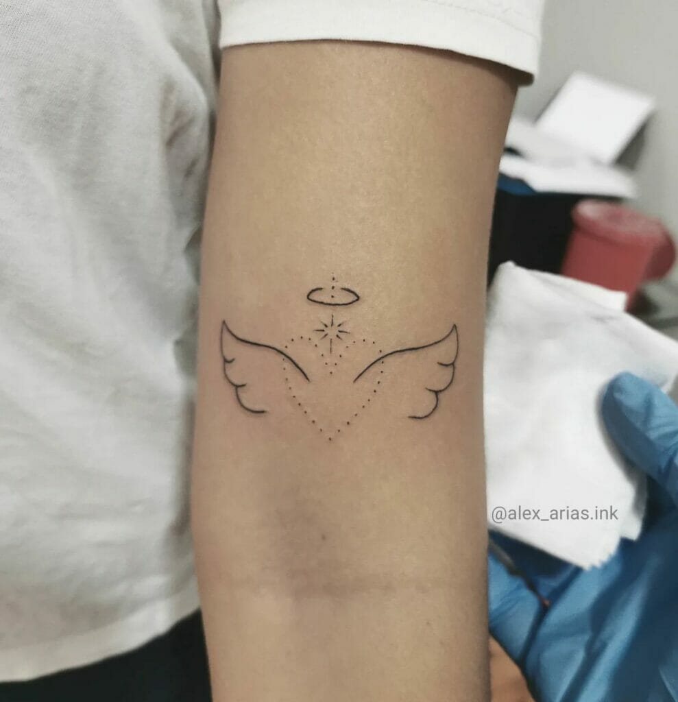 Tiny Angel Wings Tattoo