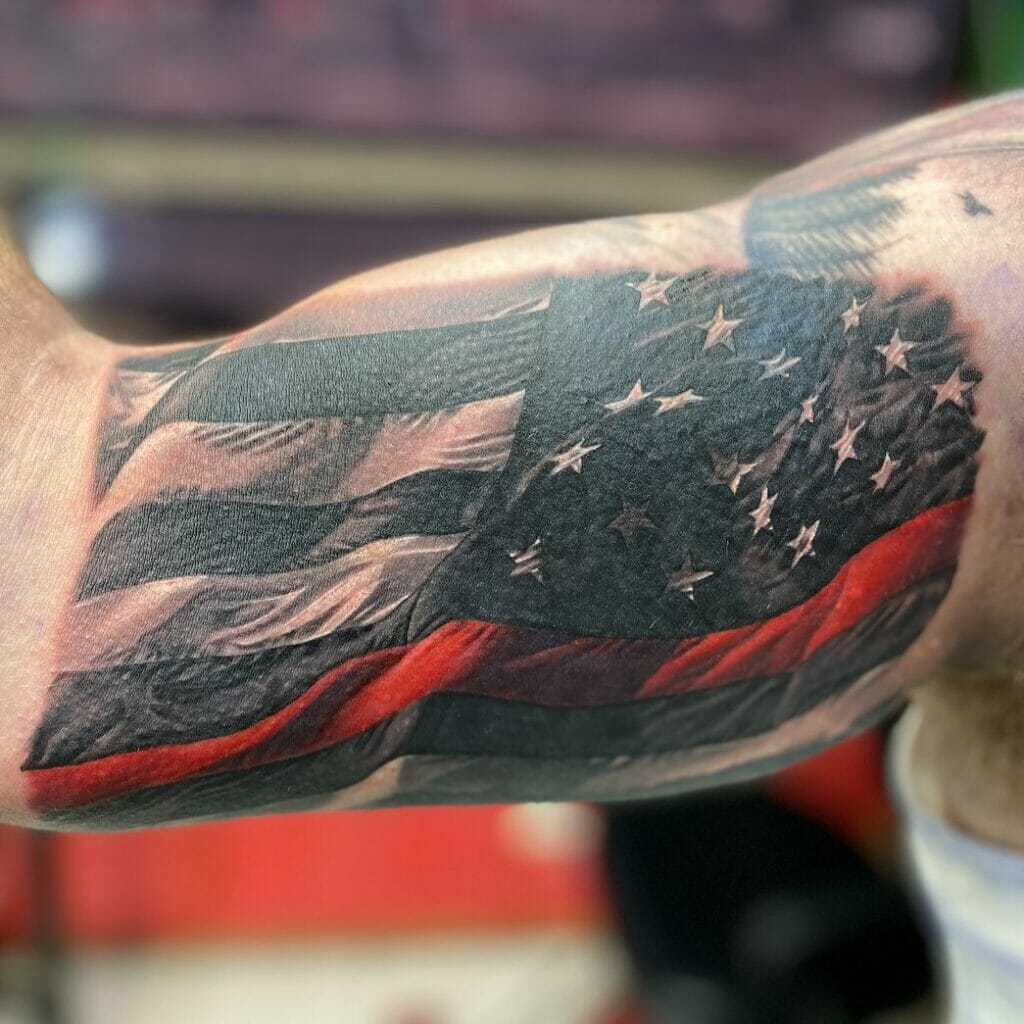 Inner Bicep Thin Red Line Flag Tattoo