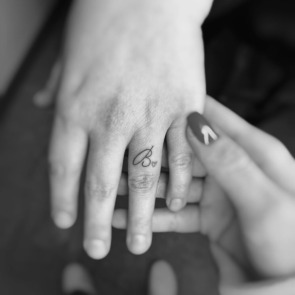 Ring Finger Tattoo