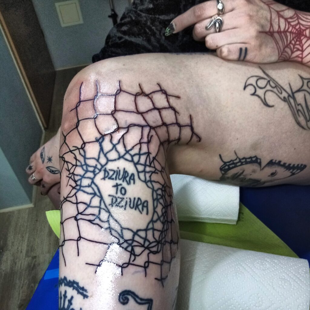 Chain Link Fence Tattoo