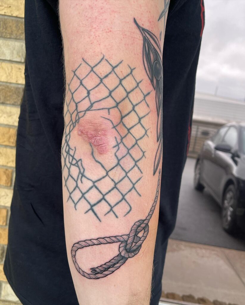 Chain Link Fence Tattoo