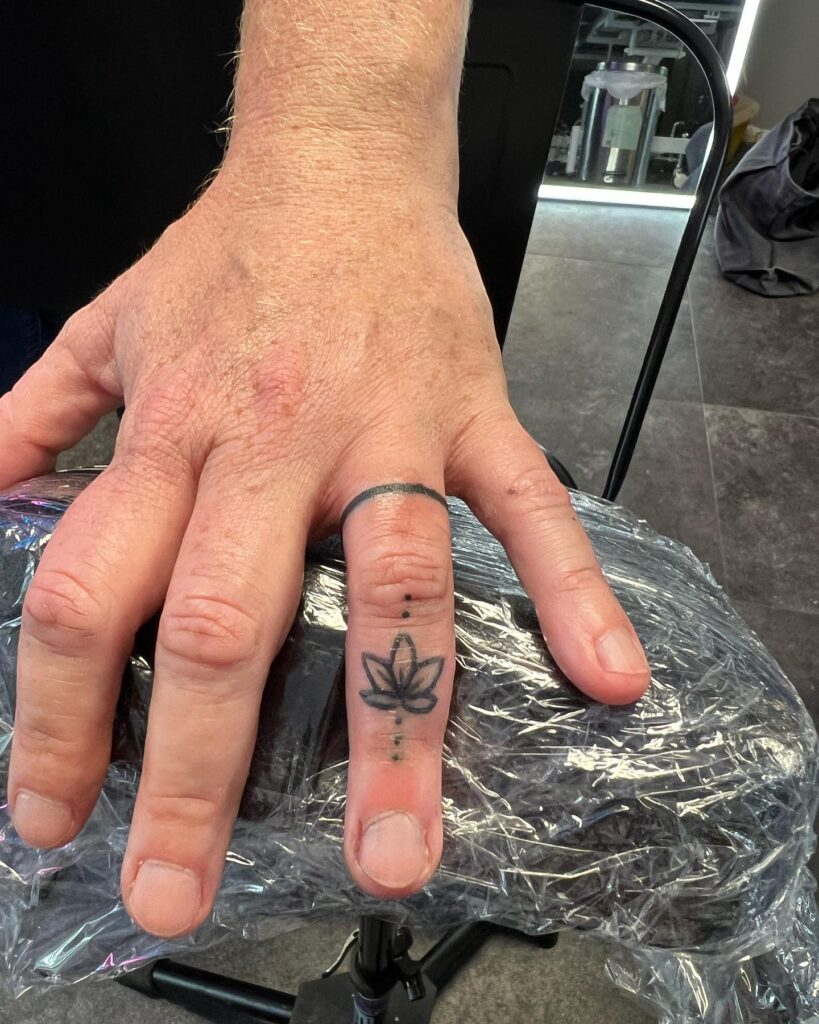 Ring Finger Tattoo