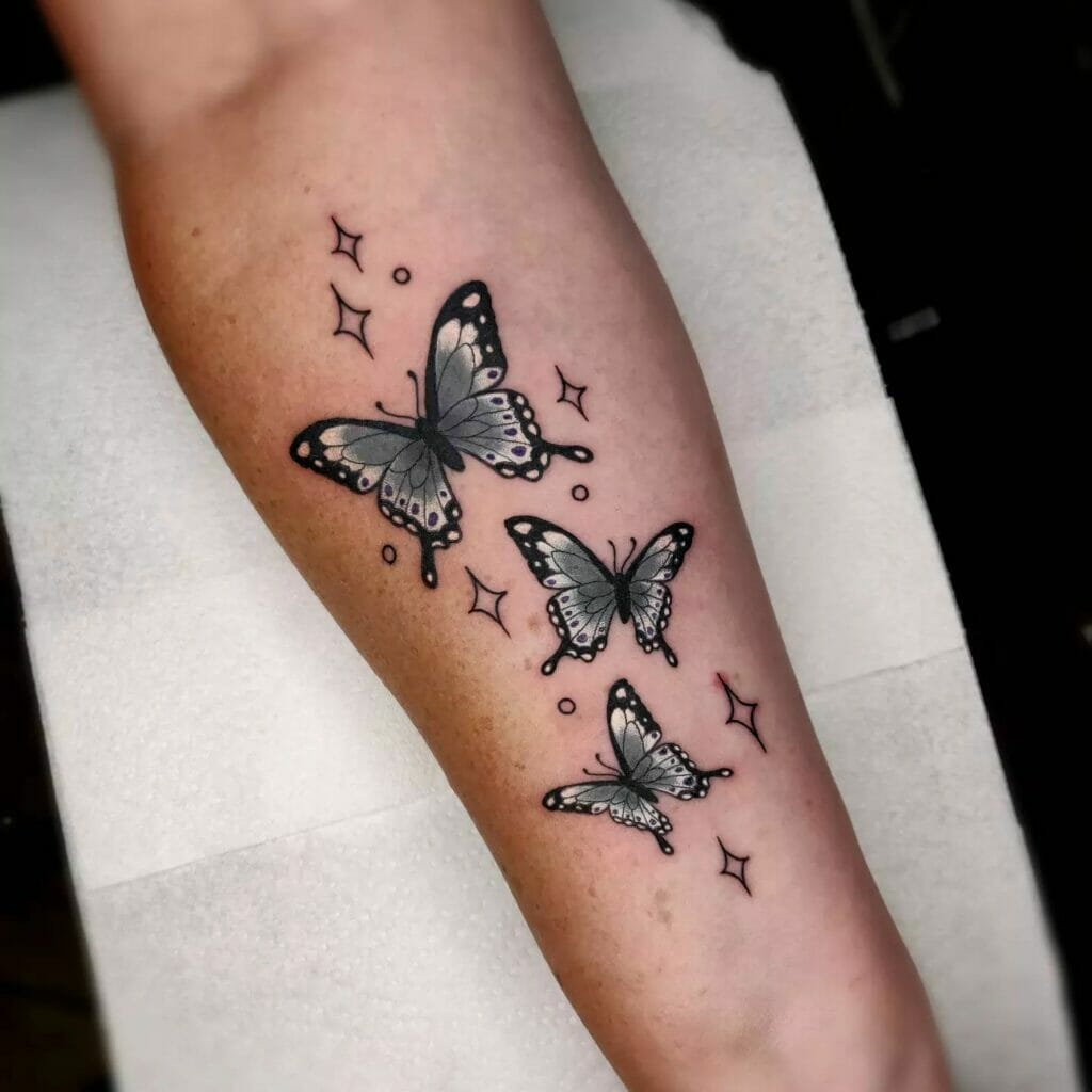 Black And Grey Three Butterfly Sleeve Tattoo