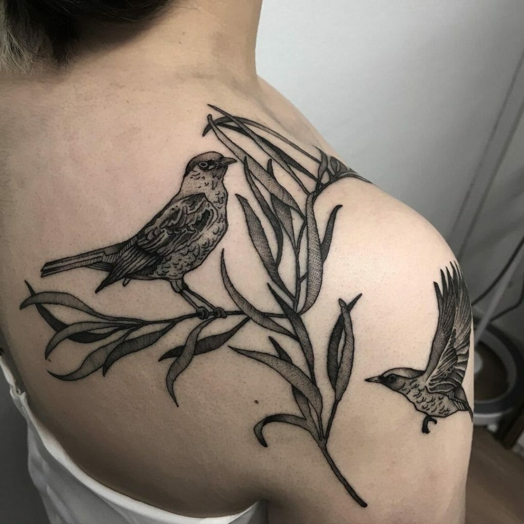 Black And Gray Bird Tattoo