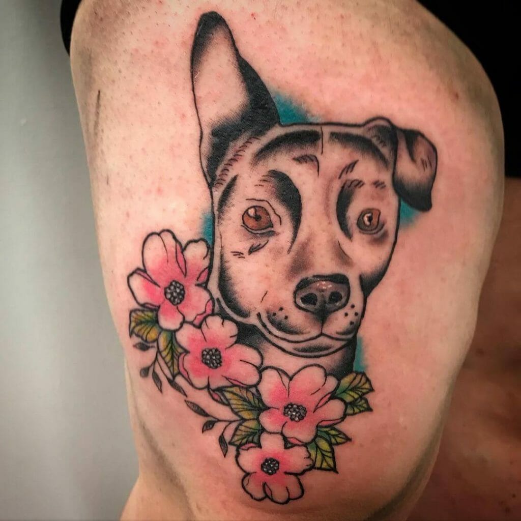 Dog Portrait Tattoo with Pink Flowers and Blue Background Accent