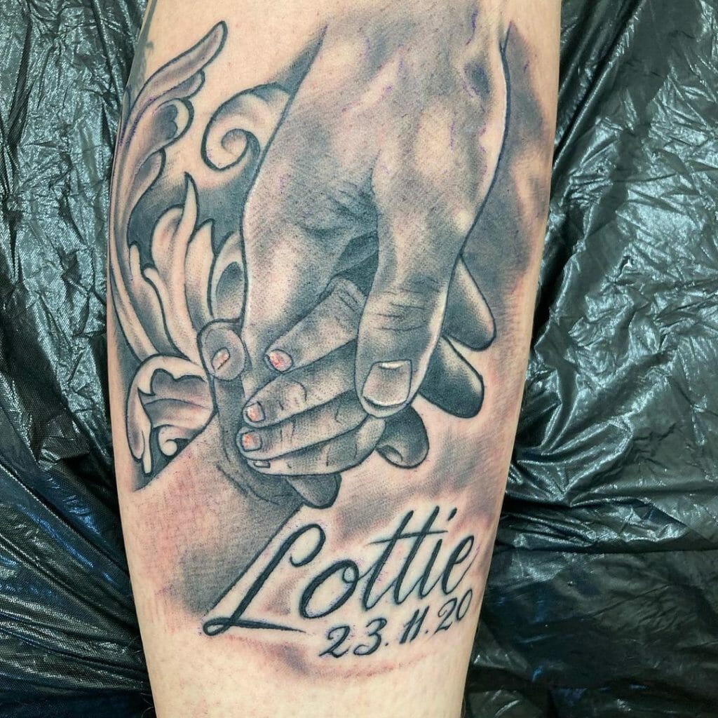 Father-Daughter Hand Holding with Name and Date Tattoo