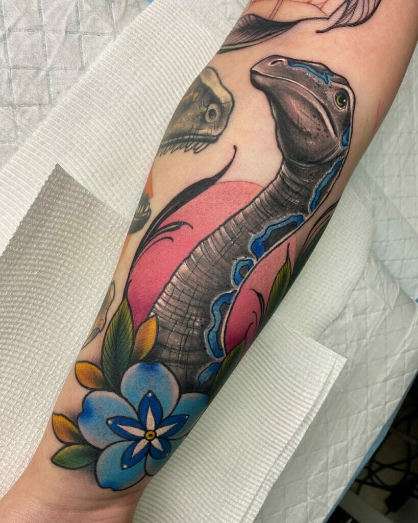 Tatuaje De Media Manga De Dinosaurio