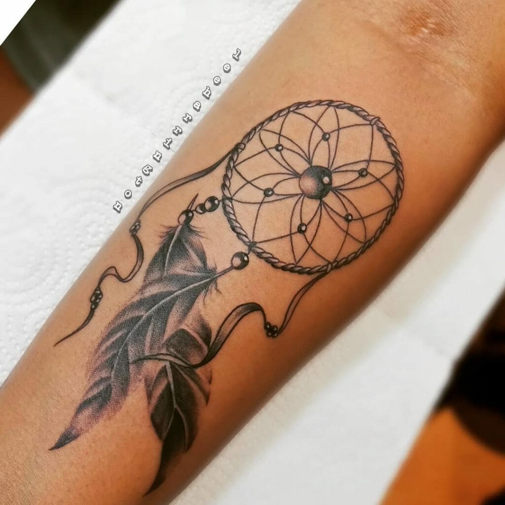 Dream catcher hand tattoo