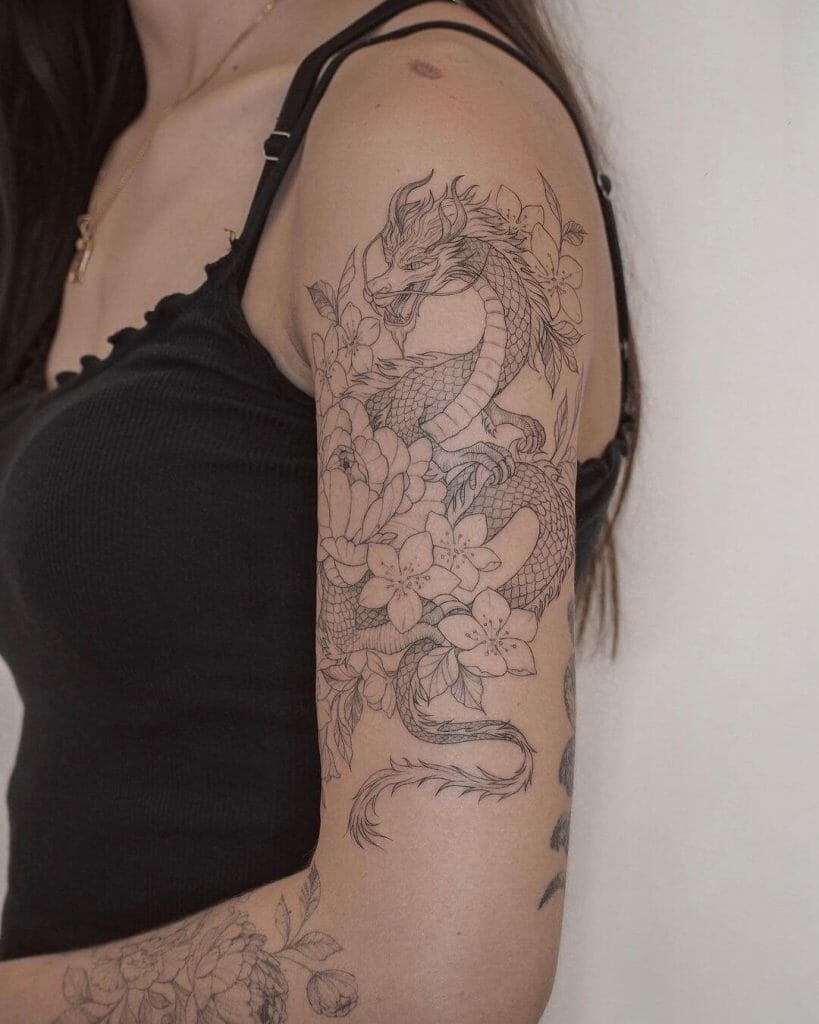 Fine-Line Dragon Upper Arm Tattoo Design