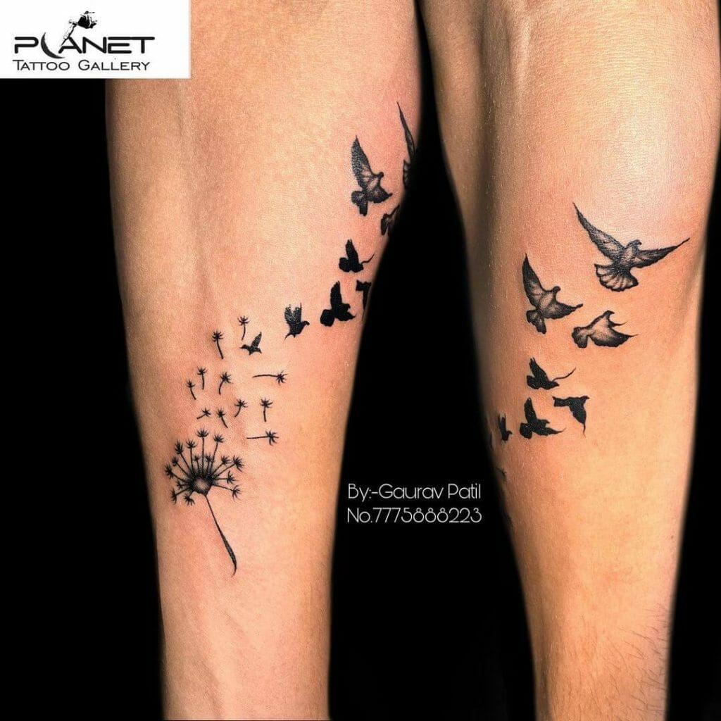 Flock of birds tattoo made from dandelion seeds