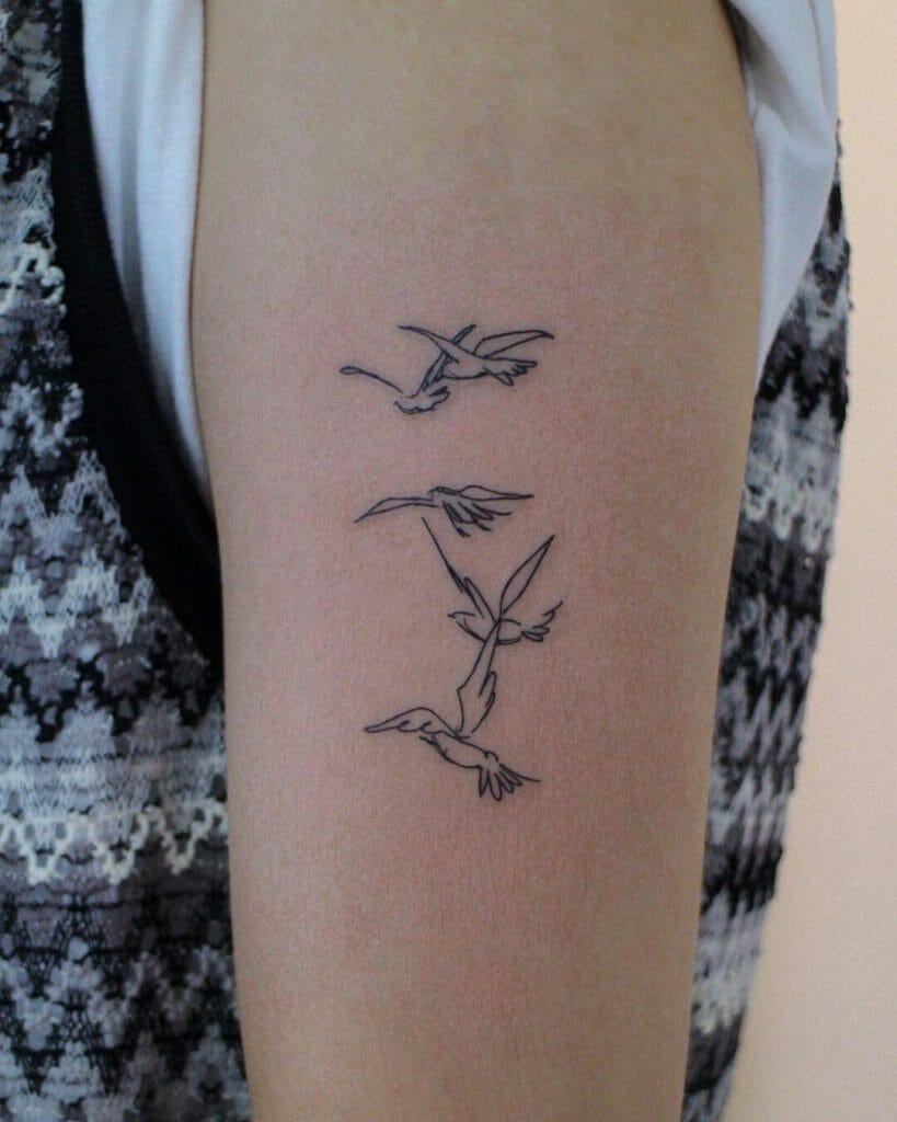 Flock of birds outline tattoo