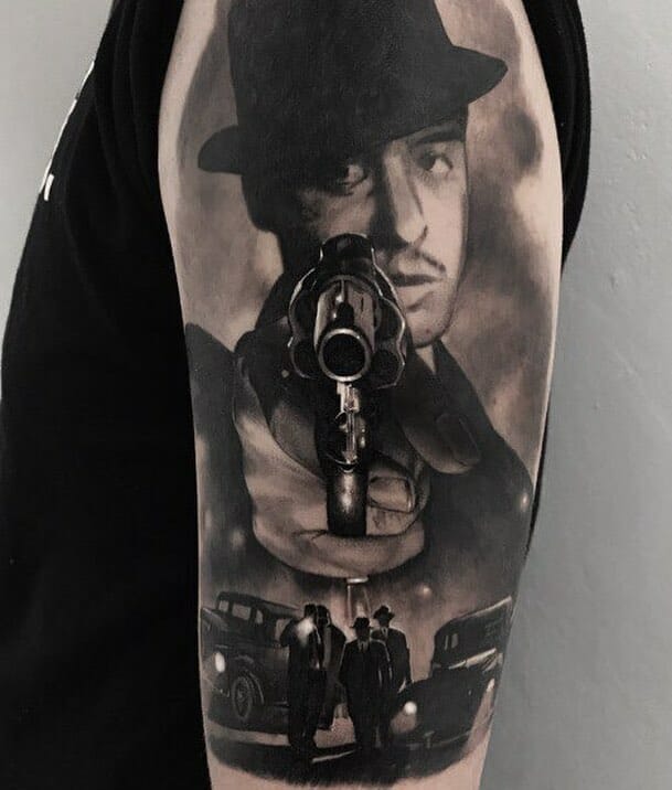 Gangster gun tattoo on hand